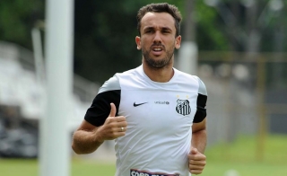 Thiago Ribeiro já acertou salários com o Galo e só aguarda acordo para viajar (Foto: Ivan Storti / Divulgação Santos FC) Thiago Ribeiro já acertou salários com o Galo e só aguarda acordo para viajar (Foto: Ivan Storti / Divulgação Santos FC)