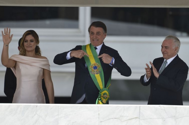 Bolsonaro recebeu a faixa de Michel Temer (Foto: Marcelo Camargo/ABr) Bolsonaro recebeu a faixa de Michel Temer (Foto: Marcelo Camargo/ABr)