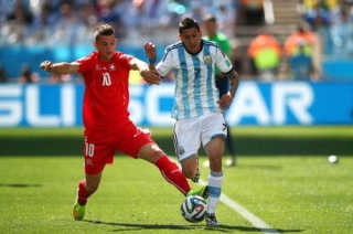 Di Maria marcou o gol que garantiu a vaga da Argentina (Foto: Getty Images/Clive Rose) Di Maria marcou o gol que garantiu a vaga da Argentina (Foto: Getty Images/Clive Rose)