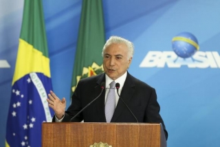 O presidente Michel Temer participa do lançamento do Documento Nacional de Identificação (digital e biométrico), no Palácio do Planalto (Foto: Marcelo Camargo/Agência Brasil) O presidente Michel Temer participa do lançamento do Documento Nacional de Identificação (digital e biométrico), no Palácio do Planalto (Foto: Marcelo Camargo/Agência Brasil)
