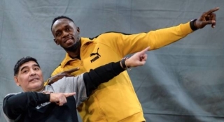 Maradona e Usain Bolt, em evento na Inglaterra no último dia 22 (Foto: Divulgação) Maradona e Usain Bolt, em evento na Inglaterra no último dia 22 (Foto: Divulgação)