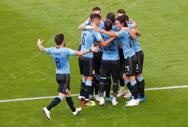 Jogadores do Uruguai comemoram gol sobre a Rússia (Foto: David Gray/Reuters) Jogadores do Uruguai comemoram gol sobre a Rússia (Foto: David Gray/Reuters)