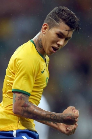 Firmino comemora gol pela seleção brasileira (Foto: JEFFERSON BERNARDES/AFP) Firmino comemora gol pela seleção brasileira (Foto: JEFFERSON BERNARDES/AFP)