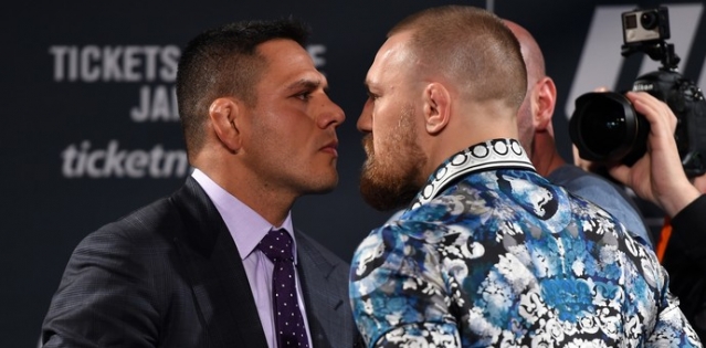 Rafael dos Anjos e Conor McGregor estavam com luta marcada para 5 de março (Foto: Getty Images) Rafael dos Anjos e Conor McGregor estavam com luta marcada para 5 de março (Foto: Getty Images)